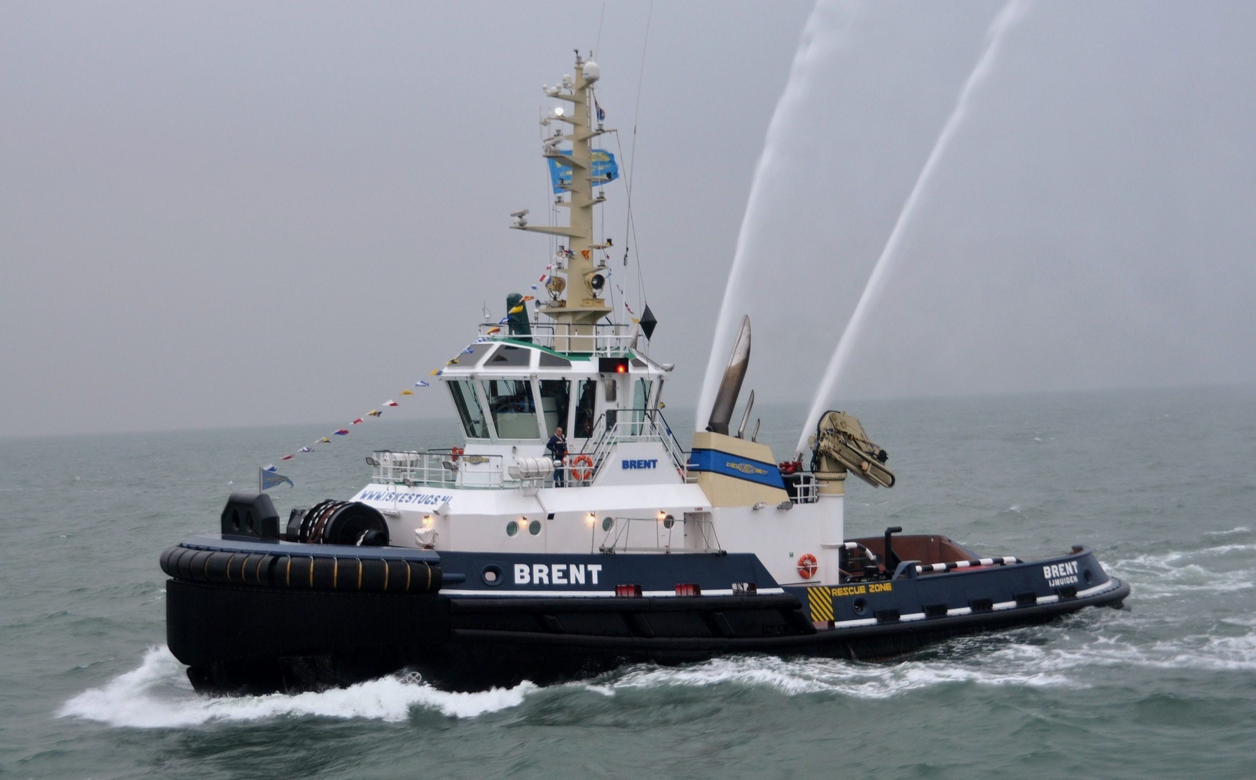 Tug Brent with fire monitors in action